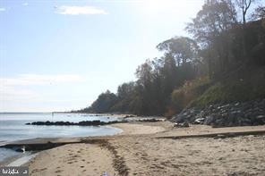 1150 Calvert Beach Road St. Leonard, MD 20685 - Photo 41 of 42 a view of ocean with large trees