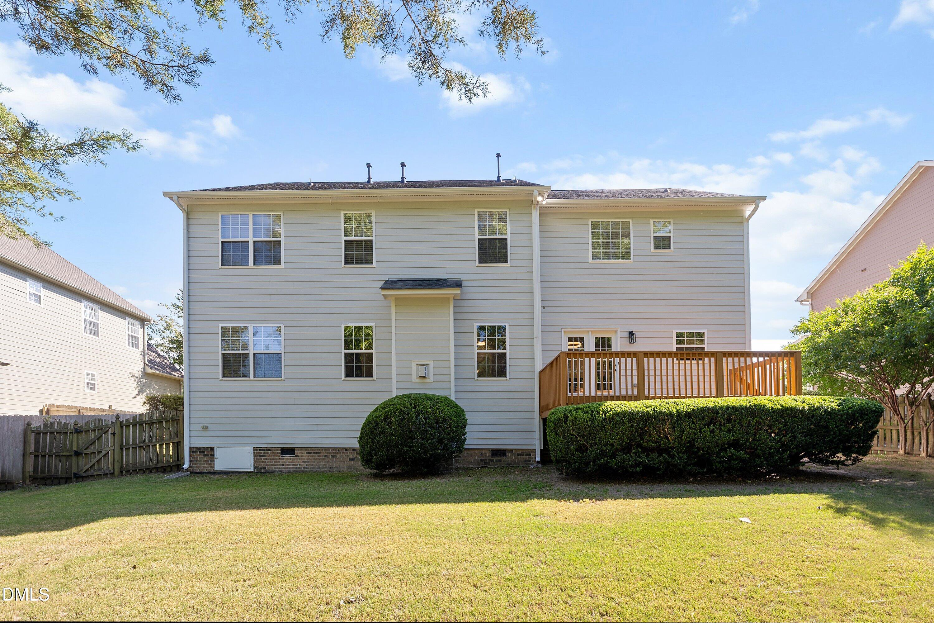 3717 Windmeade Road Wake Forest, NC 27587 - Photo 49 of 51 a front view of a house with a yard