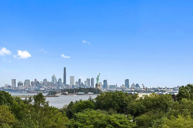 a view of a city with tall buildings