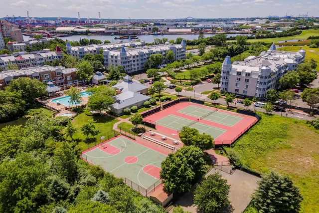 a view of a lake with a floor to ceiling window next to a lake