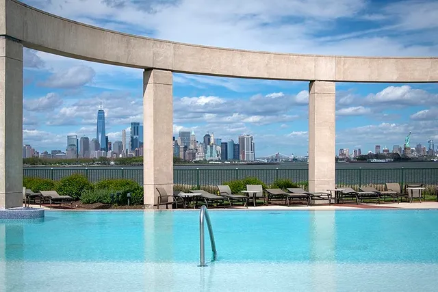 a view of a swimming pool with a patio