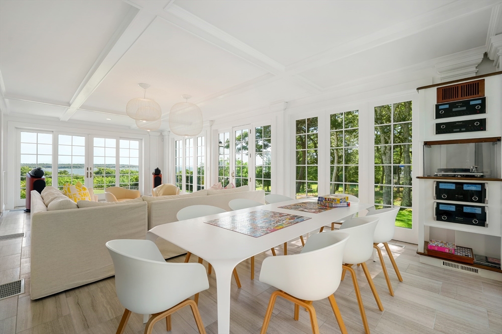 169 S Road Bourne, MA 02559 - Photo 15 of 42 a view of a dining room with furniture window and outside view