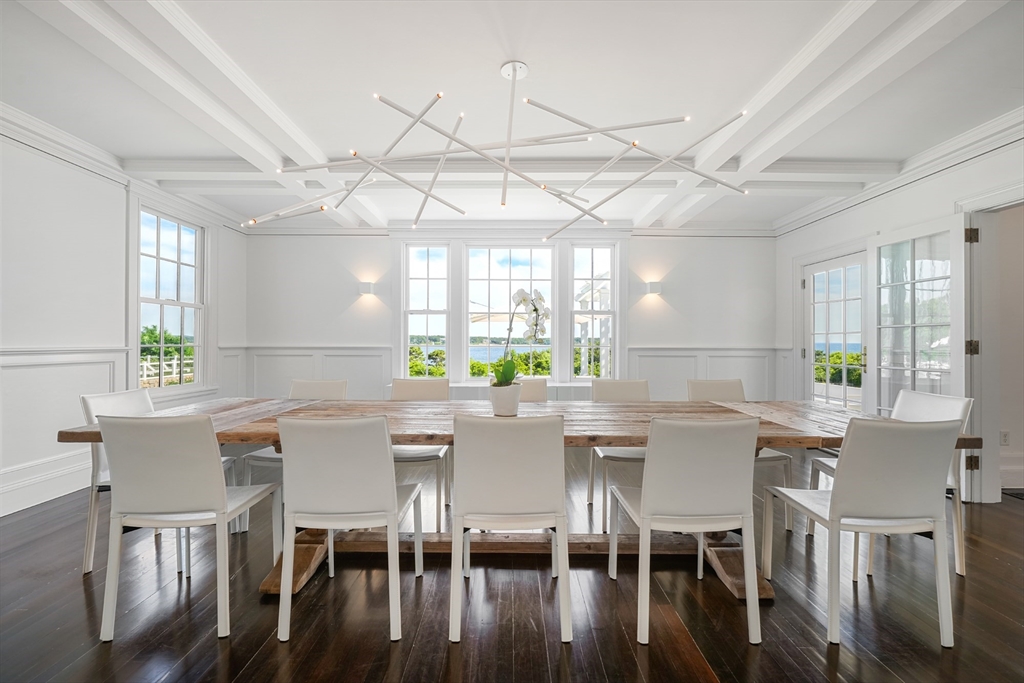 169 S Road Bourne, MA 02559 - Photo 20 of 42 a view of a dining room with furniture window and wooden floor