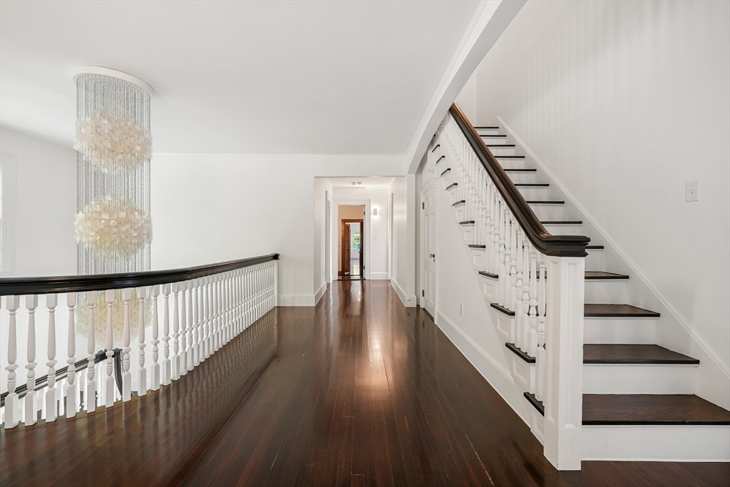 169 S Road Bourne, MA 02559 - Photo 22 of 42 a view of staircase with wooden floor and white walls