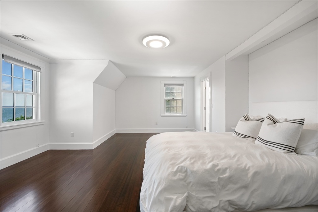 169 S Road Bourne, MA 02559 - Photo 27 of 42 a bedroom with a bed and a window