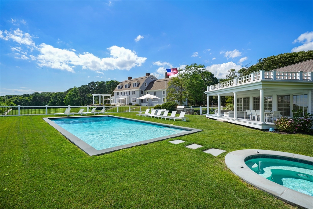 169 S Road Bourne, MA 02559 - Photo 8 of 42 a view of a house with a big yard