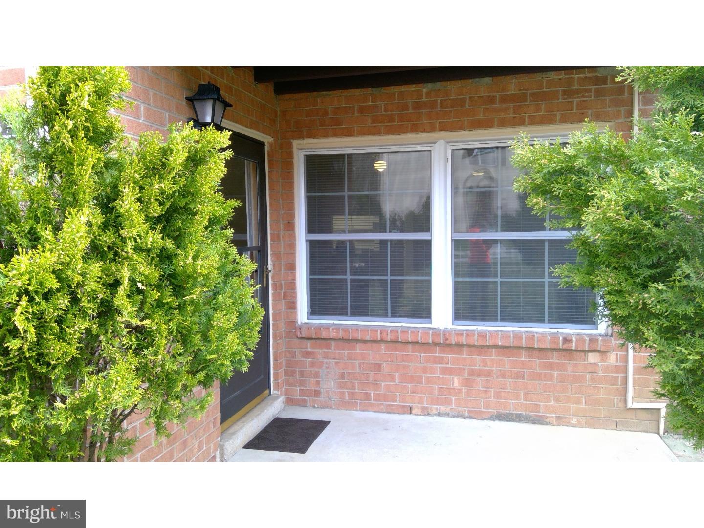 a black and white photo of a house