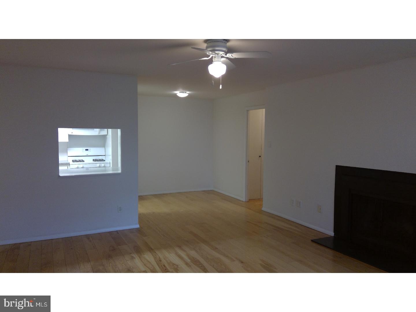 379 Old Forge Crossing Devon, PA 19333 - Photo 4 of 15 a open hall with a floor to ceiling window