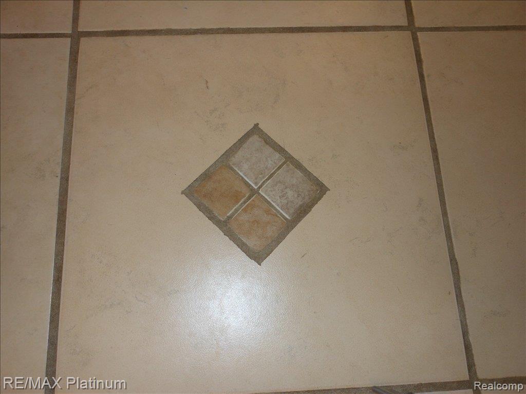 3463 North Fleming Road Fowlerville, MI 48836 - Photo 13 of 19 UPDATED FLOORING DETAIL