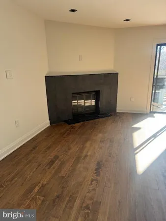 a living room with a fireplace