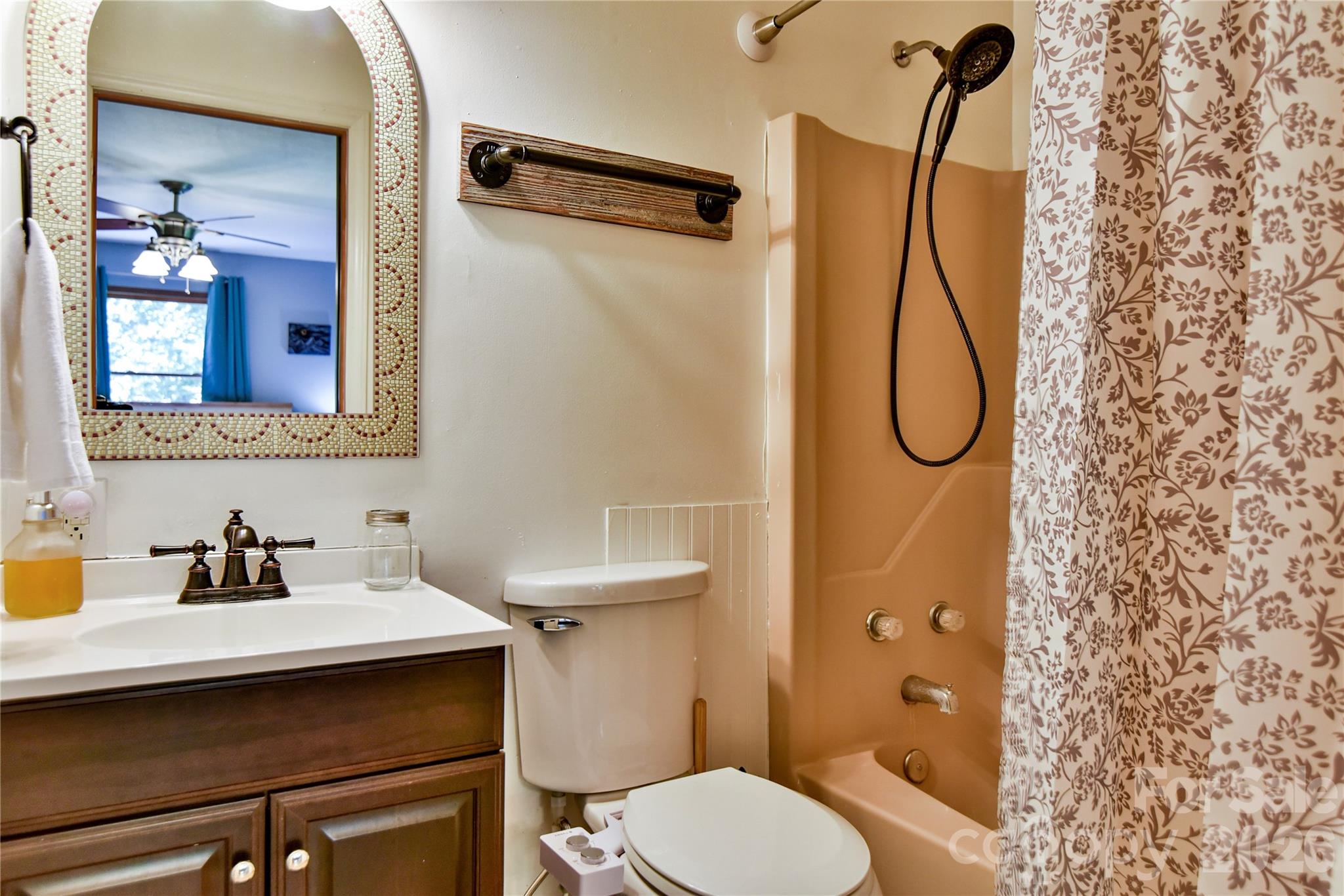 10 Gentry Branch Road Weaverville, NC 28787 - Photo 12 of 33 a bathroom with a sink a toilet and shower
