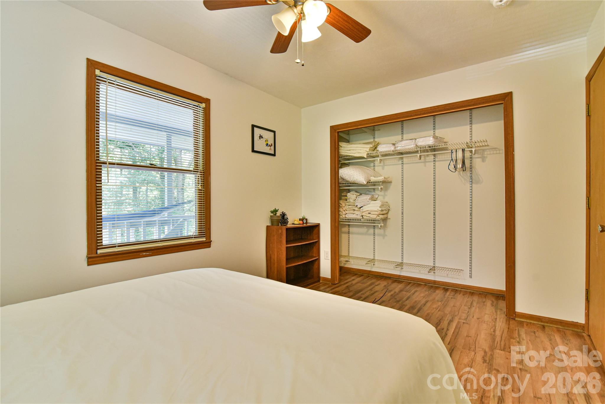 10 Gentry Branch Road Weaverville, NC 28787 - Photo 17 of 33 a bedroom with a bed and a window