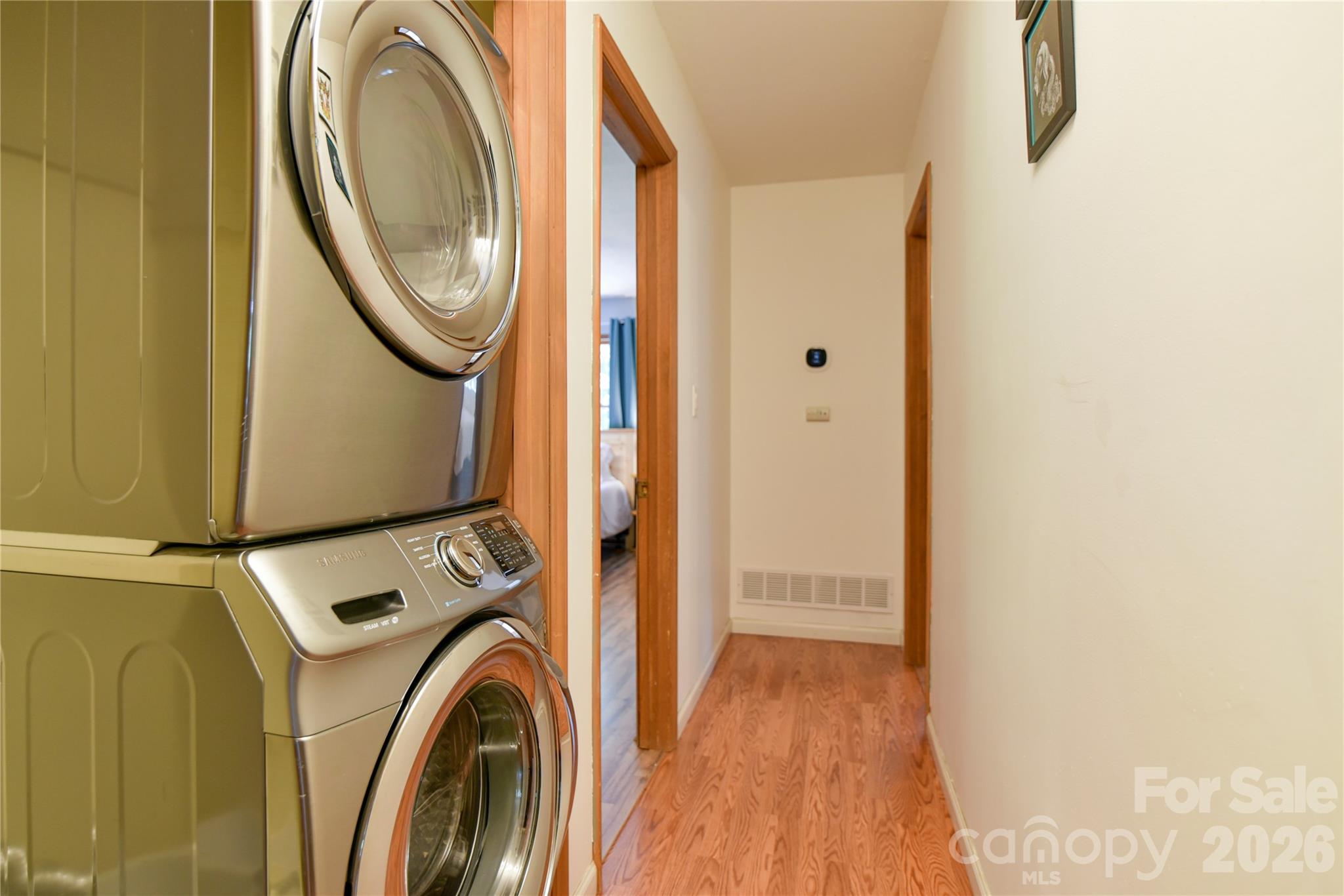 10 Gentry Branch Road Weaverville, NC 28787 - Photo 18 of 33 a view of a storage & utility room with dryer and washer