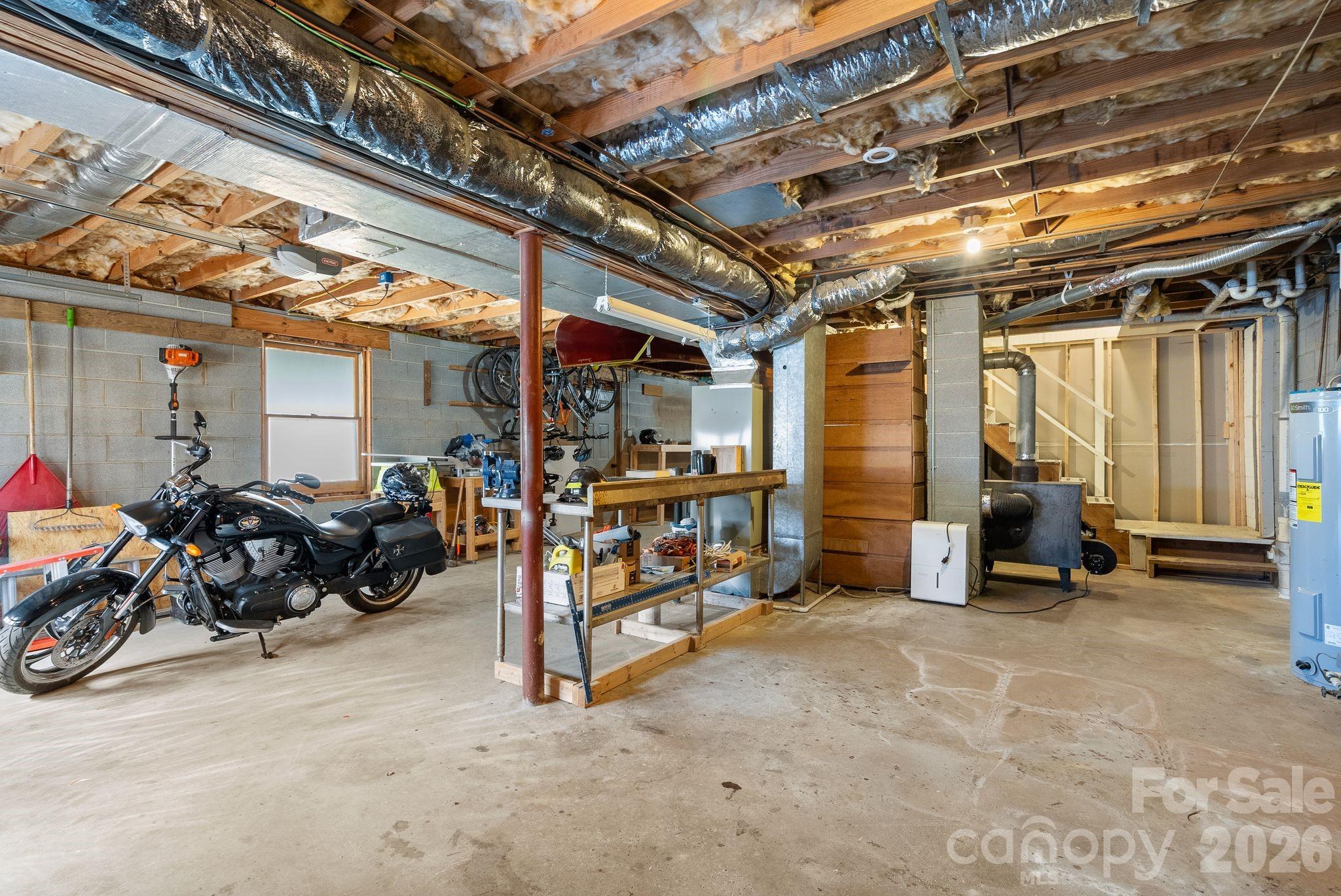 10 Gentry Branch Road Weaverville, NC 28787 - Photo 20 of 33 a view of a garage with parked cars