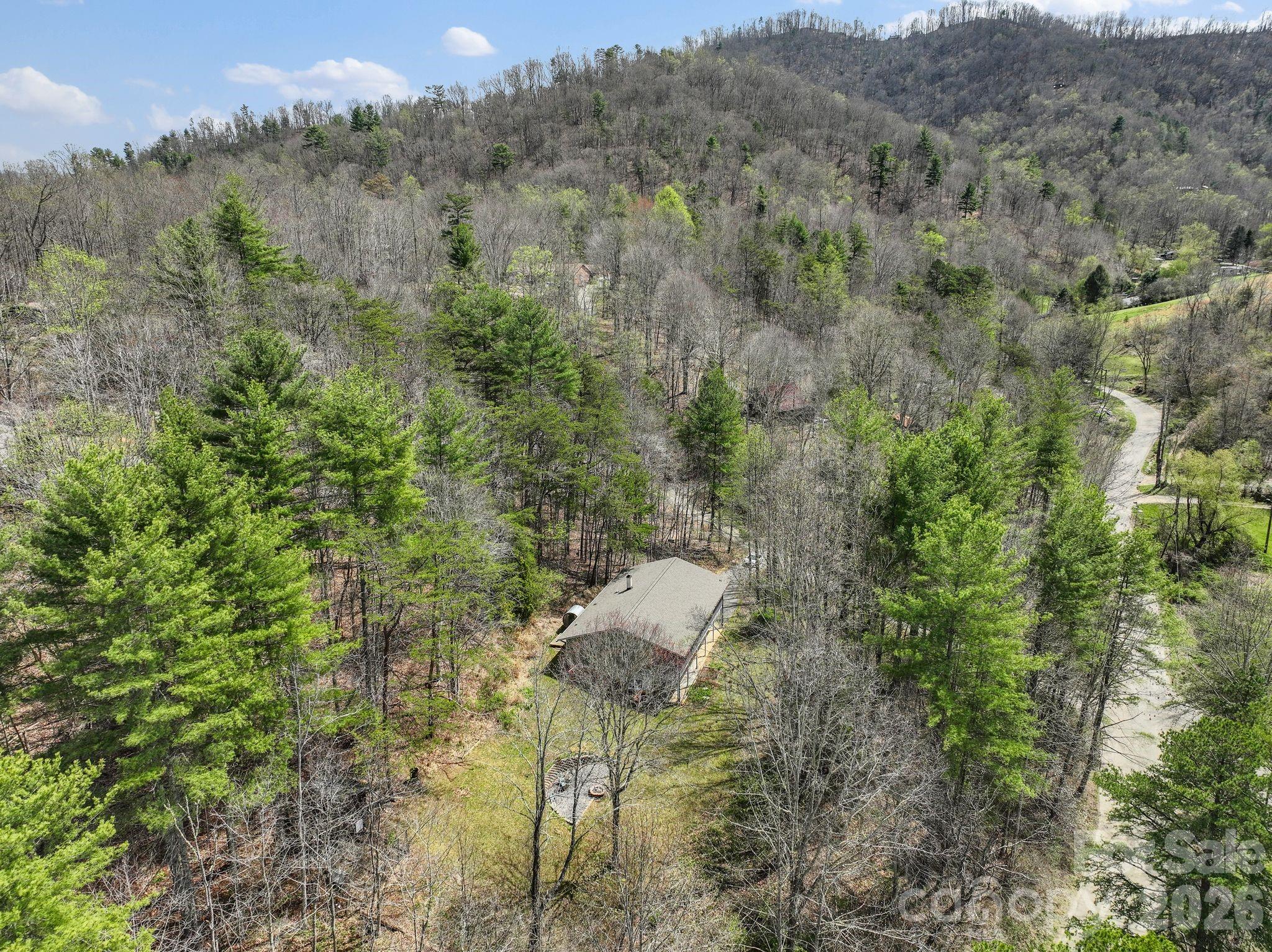 10 Gentry Branch Road Weaverville, NC 28787 - Photo 31 of 33 a view of an outdoor space and a yard