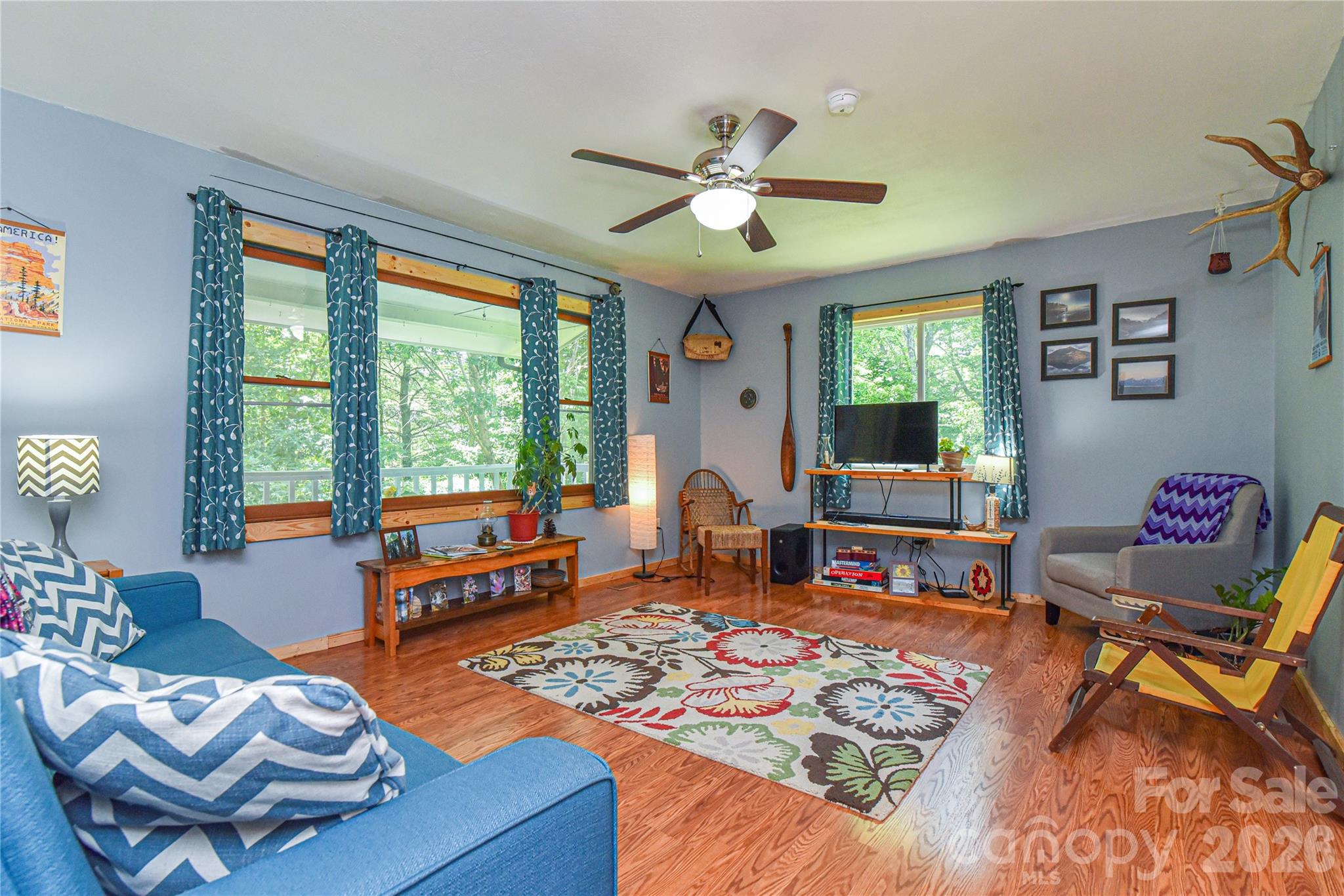 10 Gentry Branch Road Weaverville, NC 28787 - Photo 4 of 33 a living room with furniture and a large window