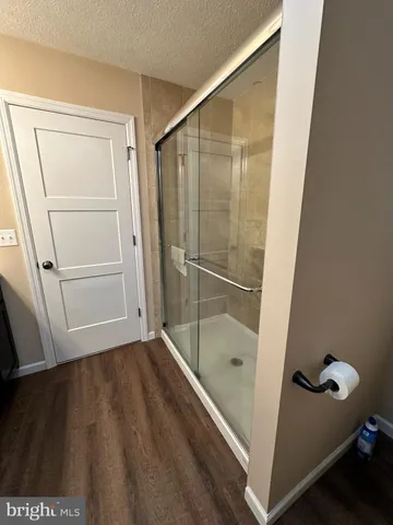 a bathroom with a sink vanity and mirror