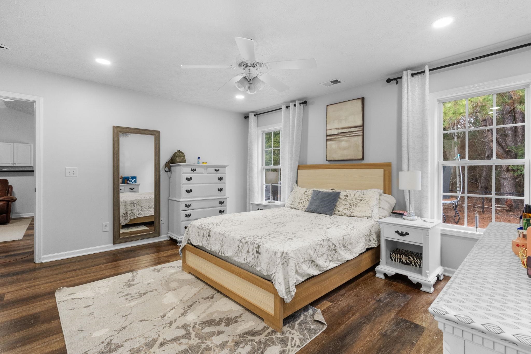 452 West Perry Road Myrtle Beach, SC 29579 - Photo 16 of 26 Bedroom featuring dark wood-style flooring, a ceiling fan, and recessed lighting