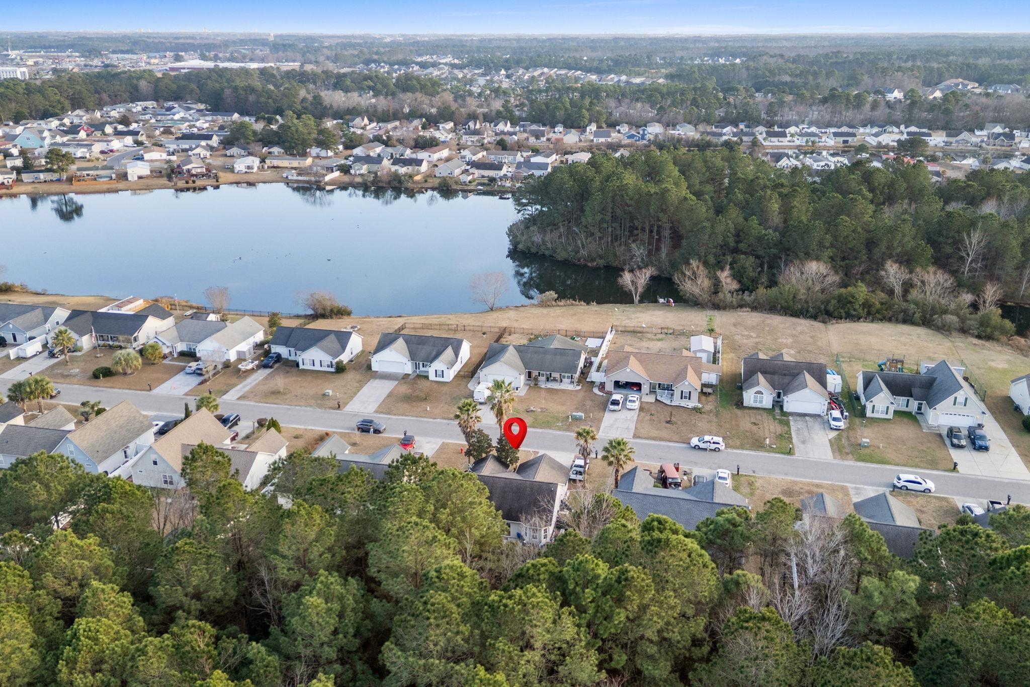 452 West Perry Road Myrtle Beach, SC 29579 - Photo 24 of 26 Aerial view of property and surrounding area featuring a nearby body of water and nearby suburban area