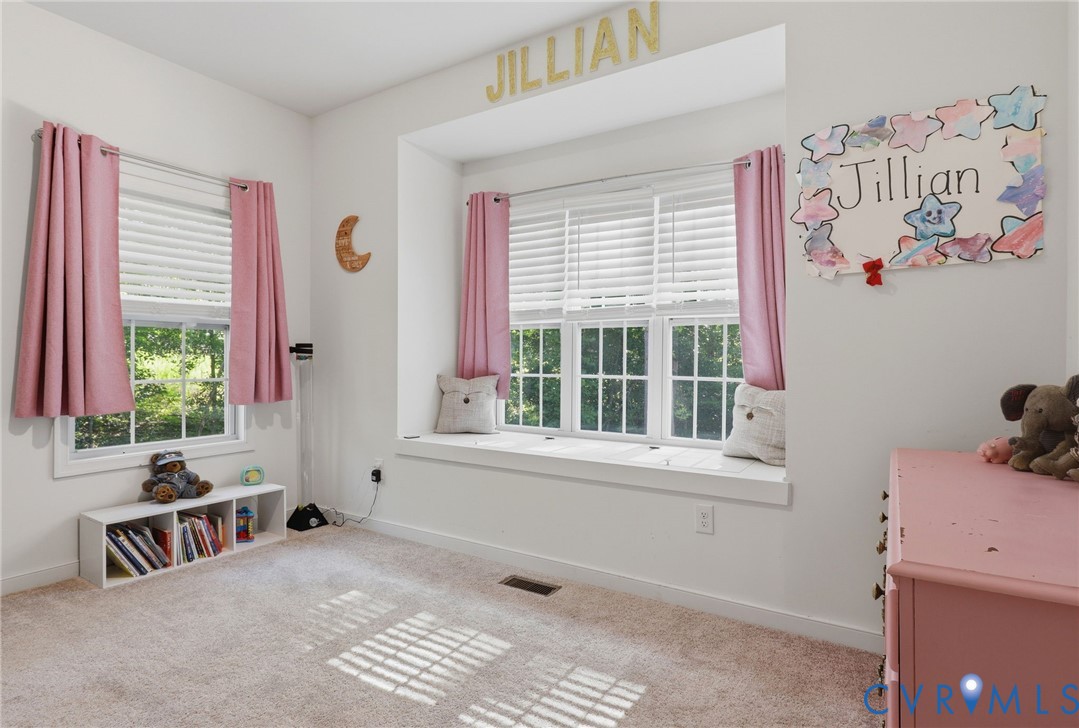 1495 Dominion Springs Road Powhatan, VA 23139 - Photo 28 of 49 large bedroom with window seat, storage on main le