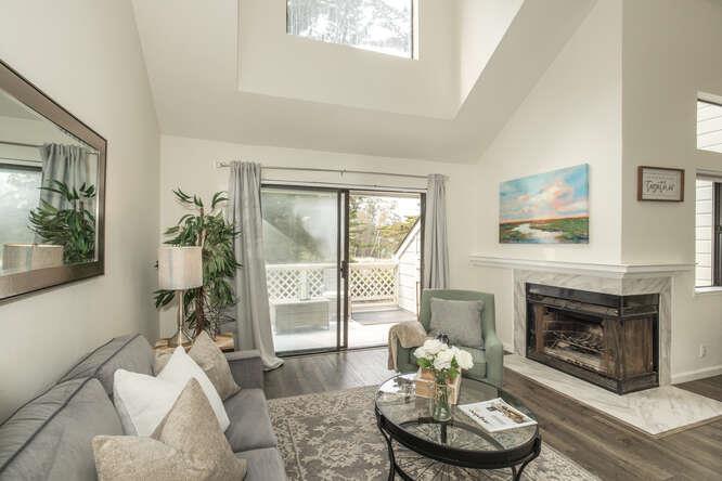 2601 Willowbrook Lane, Unit 6 Aptos, CA 95003 - Photo 16 of 43 a living room with furniture a window and a fireplace