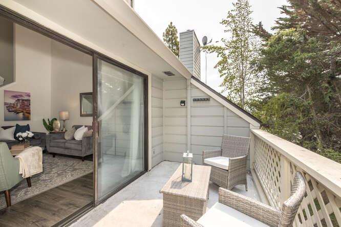 2601 Willowbrook Lane, Unit 6 Aptos, CA 95003 - Photo 18 of 43 a balcony with wooden floor and outdoor seating
