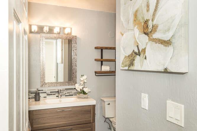 2601 Willowbrook Lane, Unit 6 Aptos, CA 95003 - Photo 33 of 43 a bathroom with a sink mirror and a shower