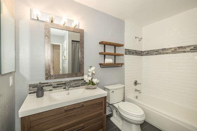 2601 Willowbrook Lane, Unit 6 Aptos, CA 95003 - Photo 34 of 43 a bathroom with a sink toilet vanity and shower