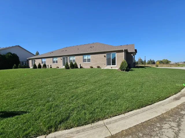a view of a lake with a big yard