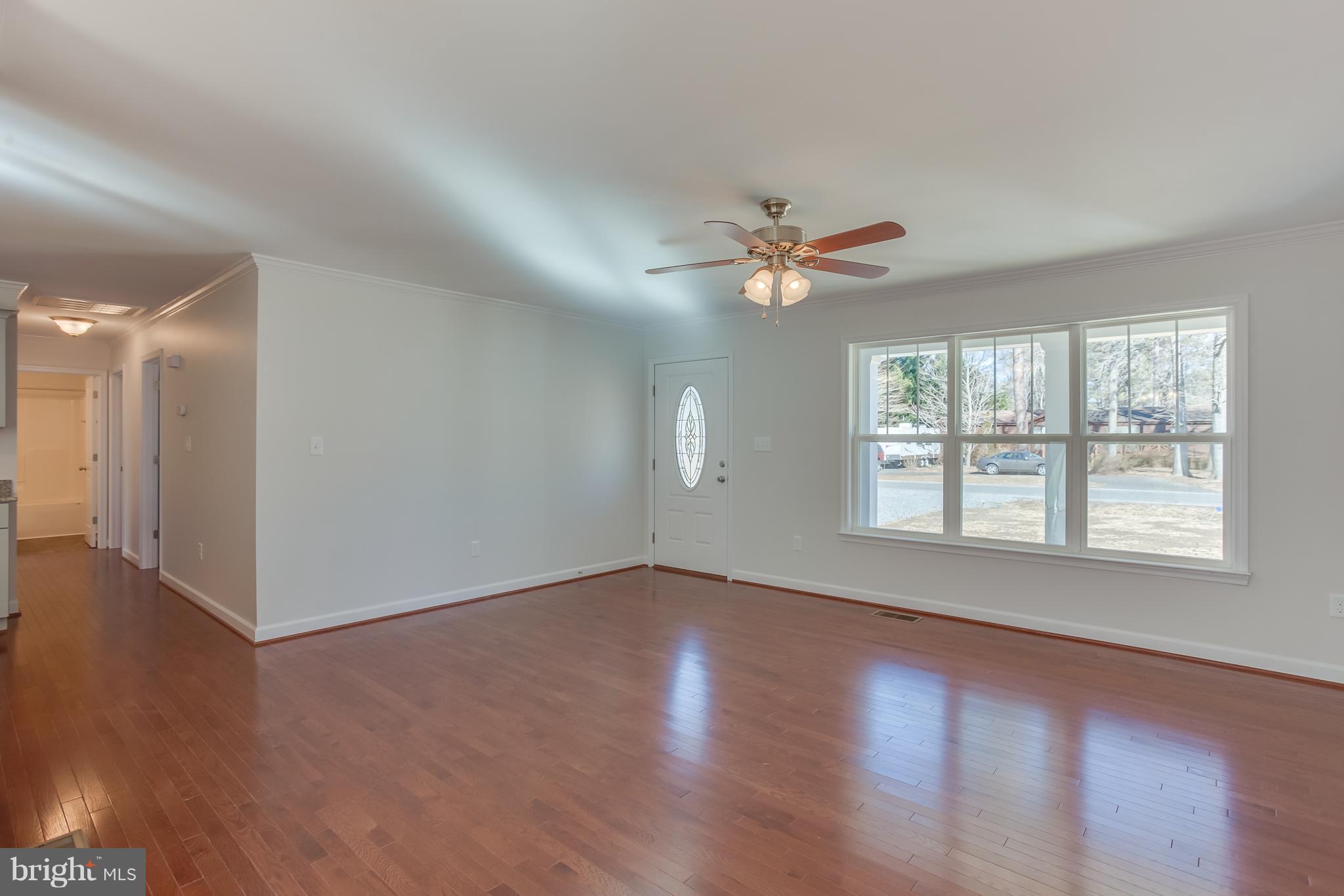 7 Columbia Road Colonial Beach, VA 22443 - Photo 3 of 24 Living Room - Hardwood is an upgrade
