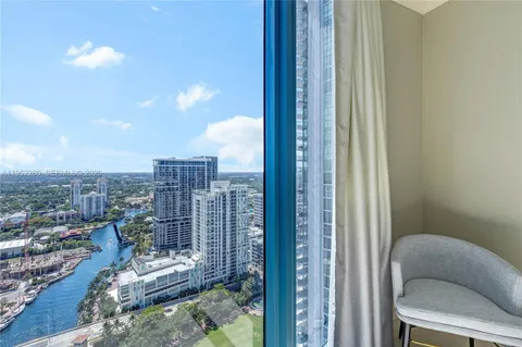 a balcony with furniture and city view