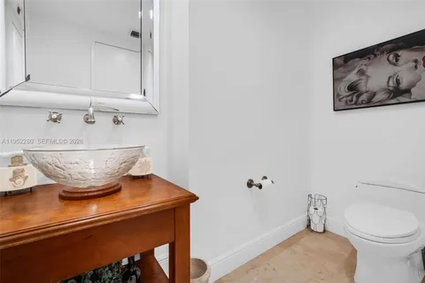 a bathroom with a shower and a sink
