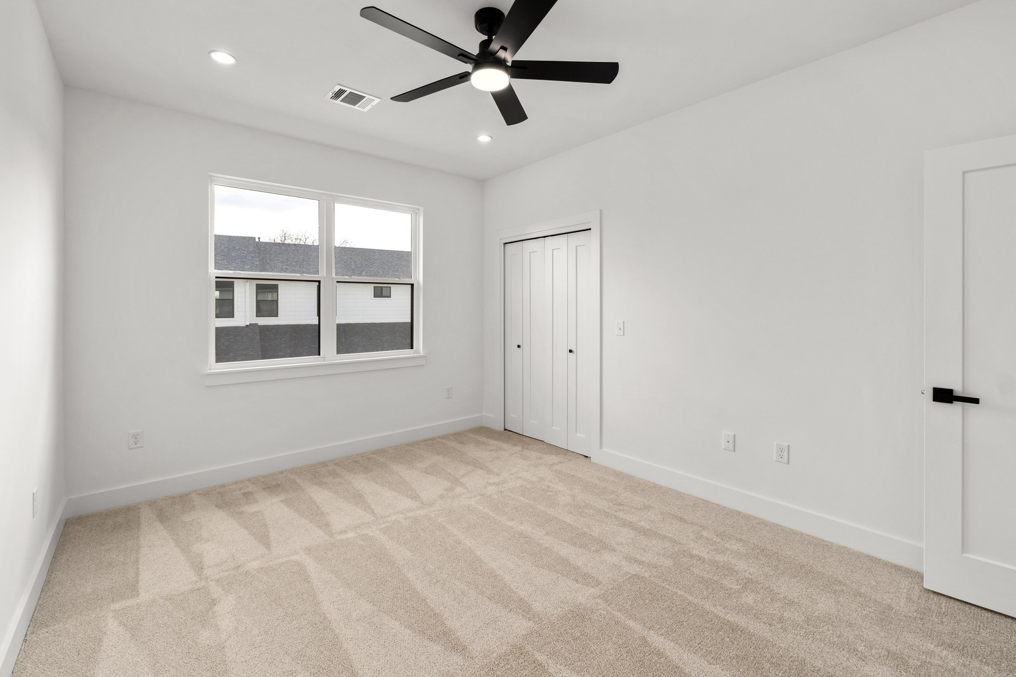 1500 Sylvan Glade, Unit 1B Austin, TX 78745 - Photo 20 of 29 a view of an empty room with a window