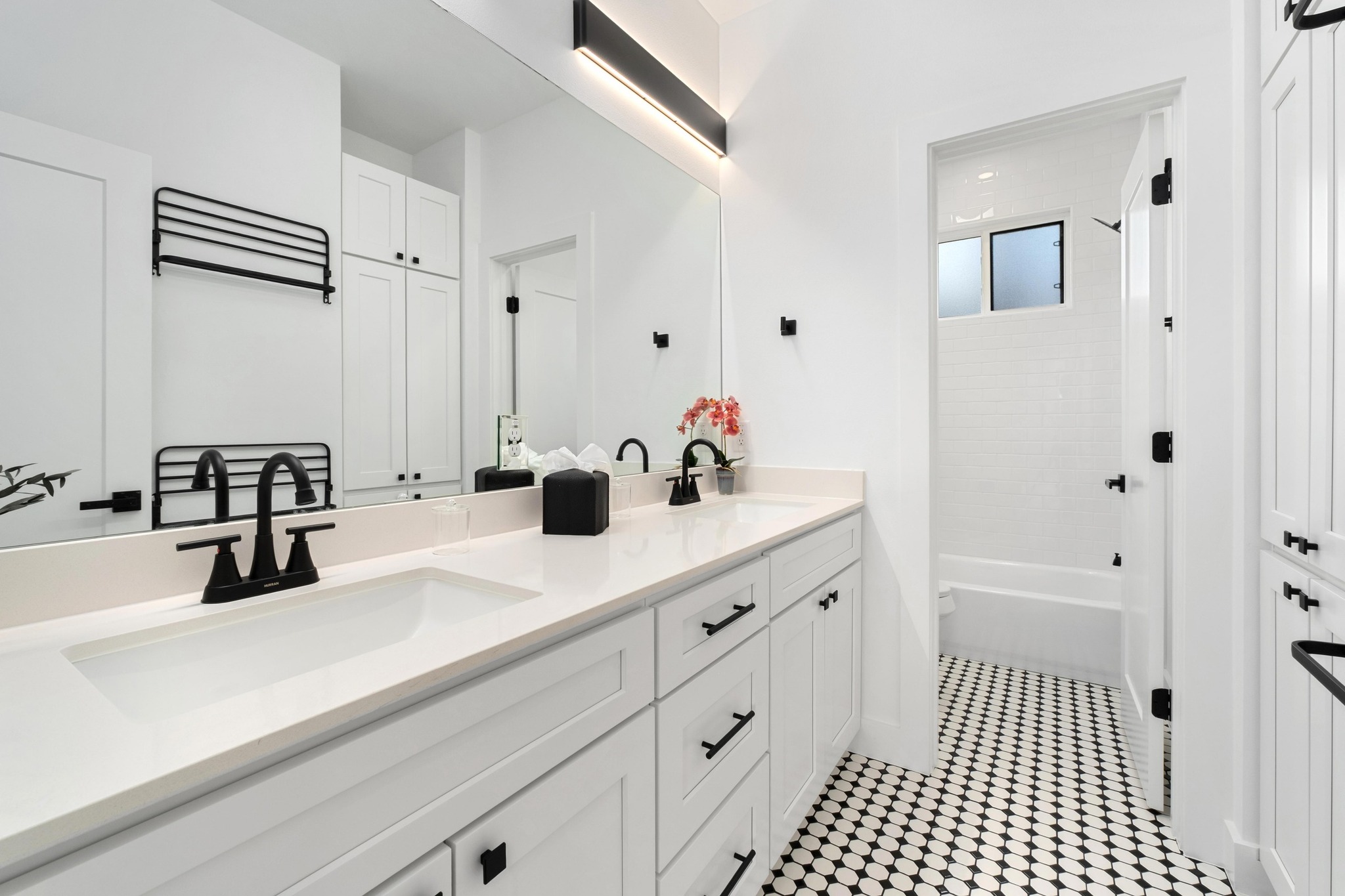 1500 Sylvan Glade, Unit 1B Austin, TX 78745 - Photo 23 of 29 a bathroom with a sink and a mirror