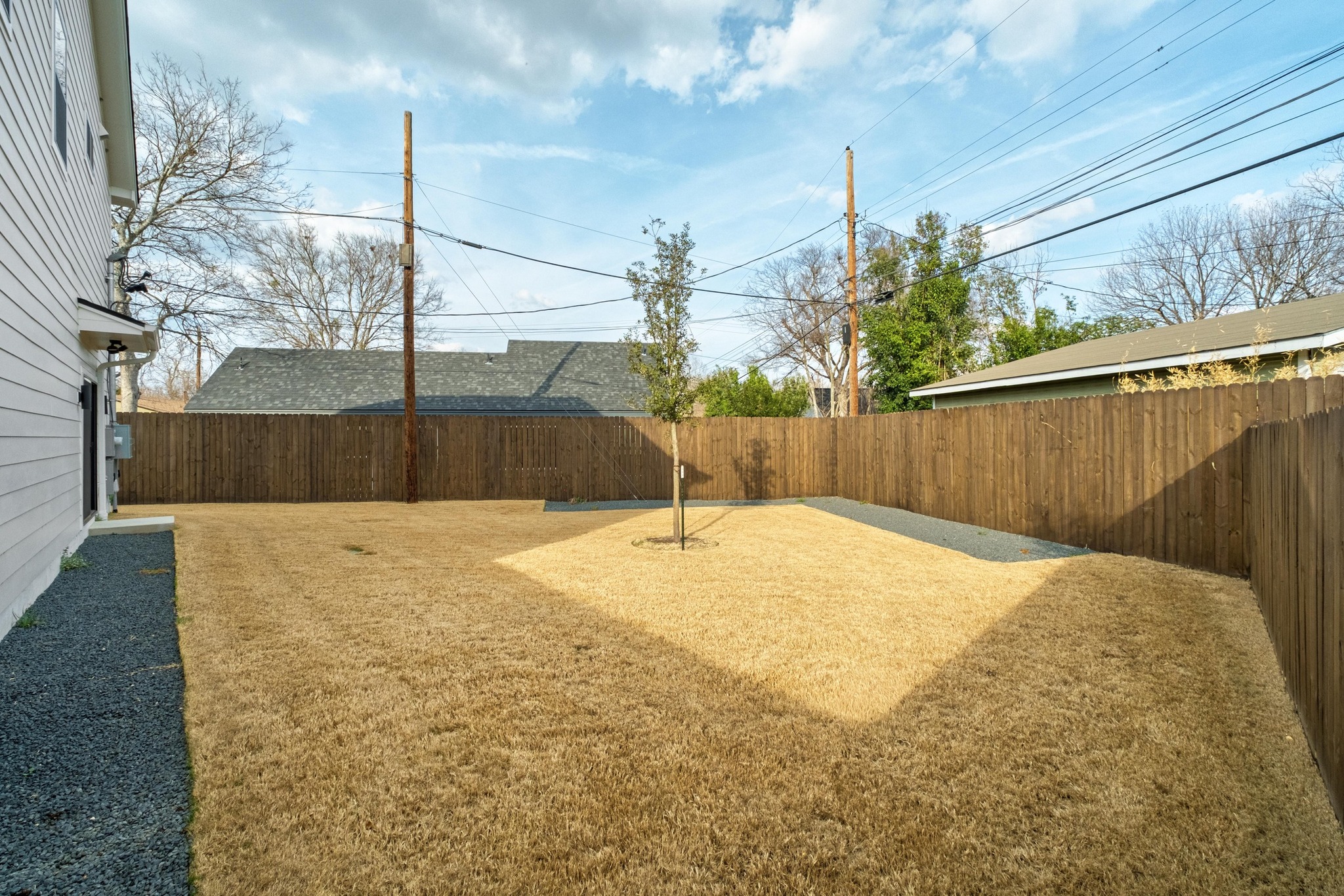 1500 Sylvan Glade, Unit 1B Austin, TX 78745 - Photo 27 of 29 a swimming pool with yard