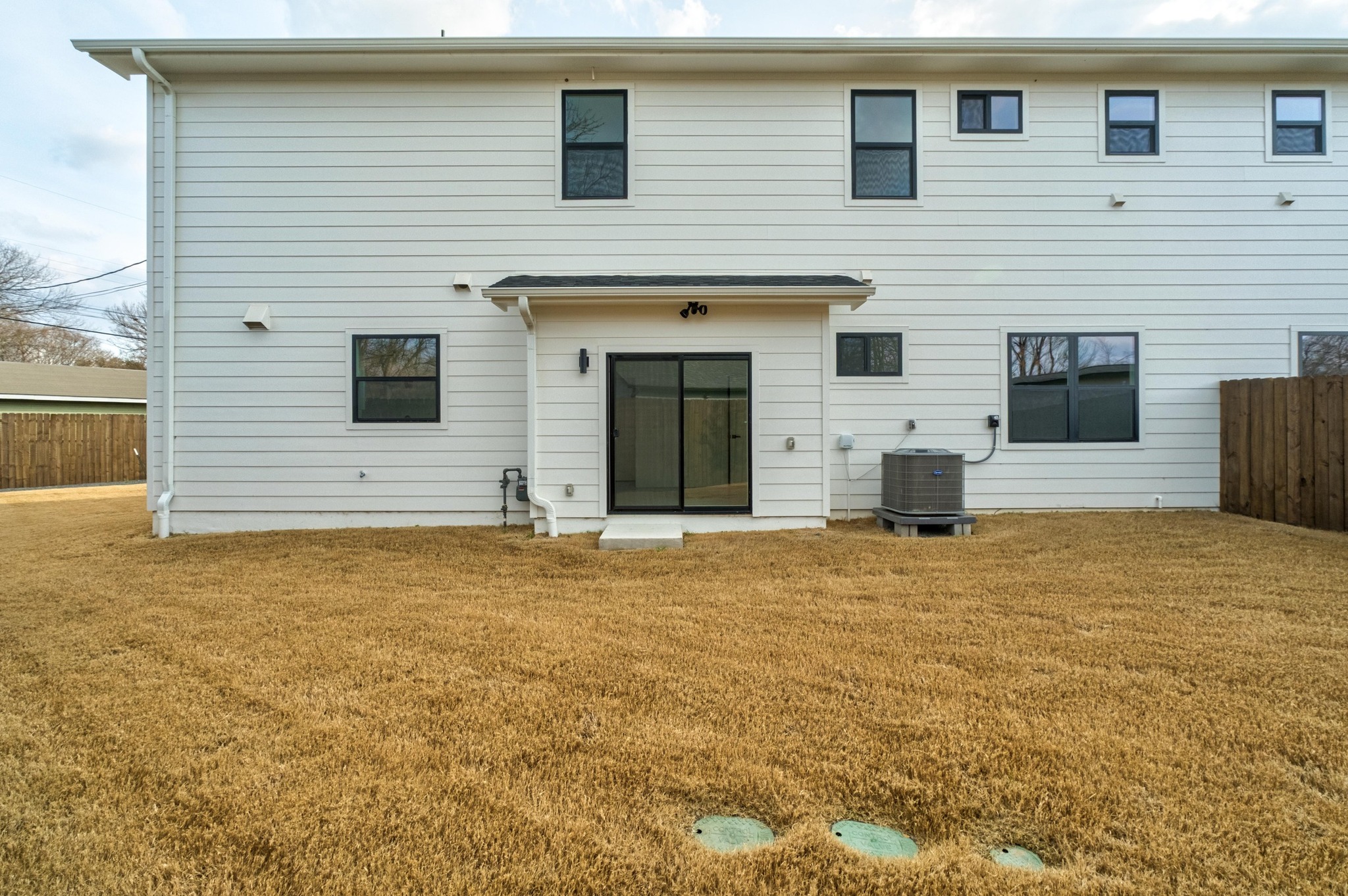 1500 Sylvan Glade, Unit 1B Austin, TX 78745 - Photo 29 of 29 a front view of a house with a yard