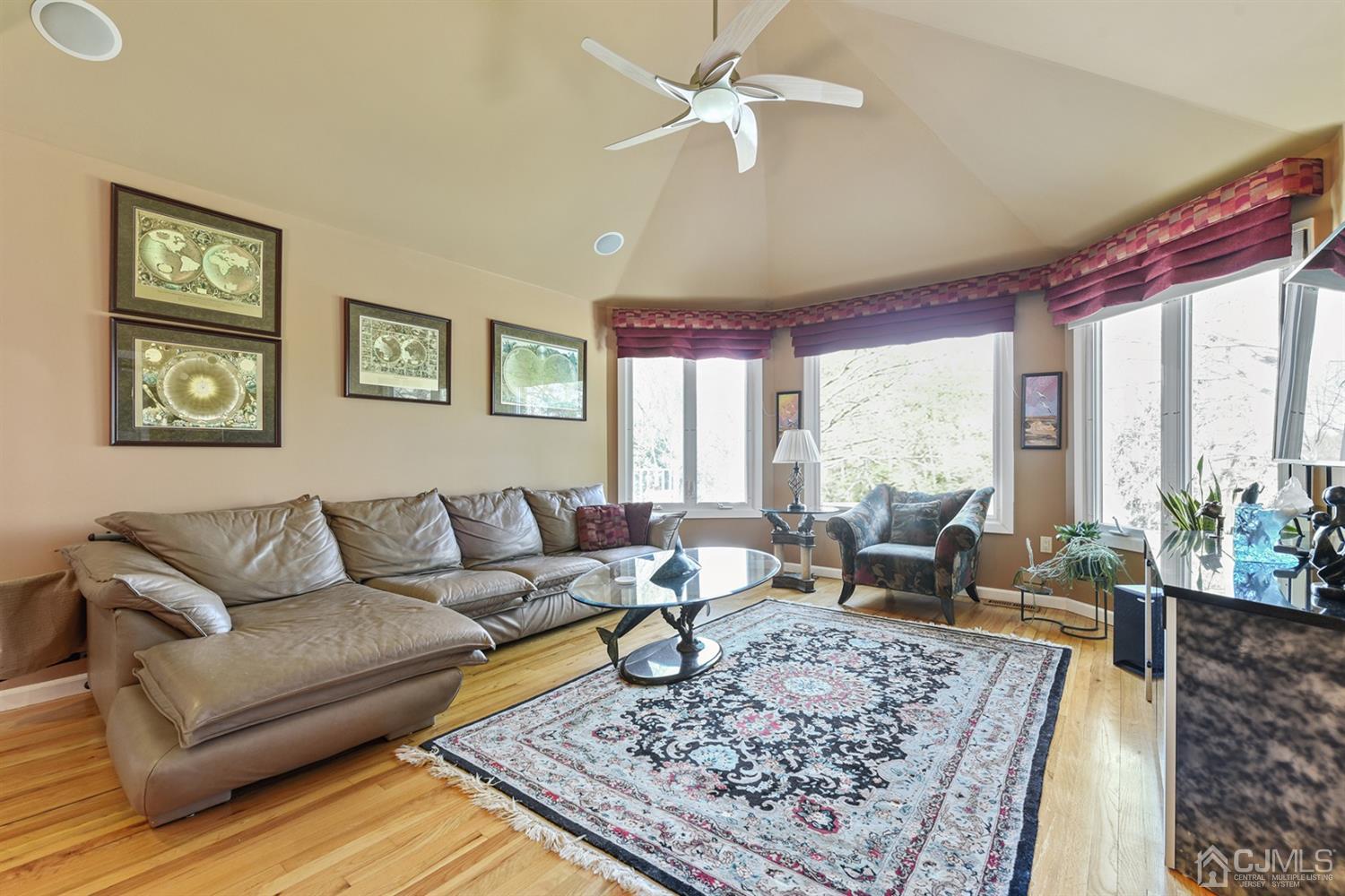 27 Agate Road East Brunswick, NJ 08816 - Photo 11 of 31 a living room with furniture or couch and a large window