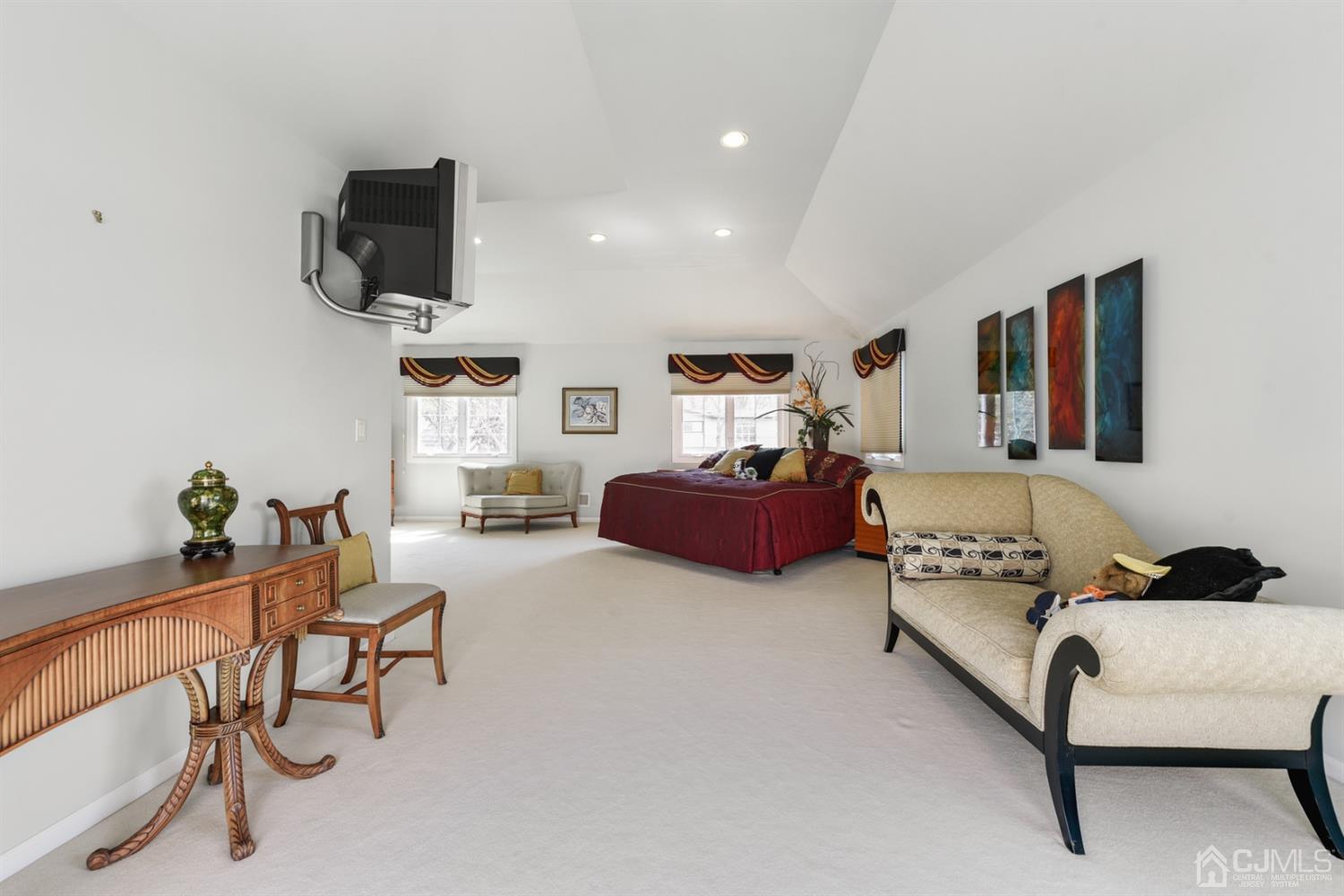 27 Agate Road East Brunswick, NJ 08816 - Photo 14 of 31 a living room with furniture and a flat screen tv