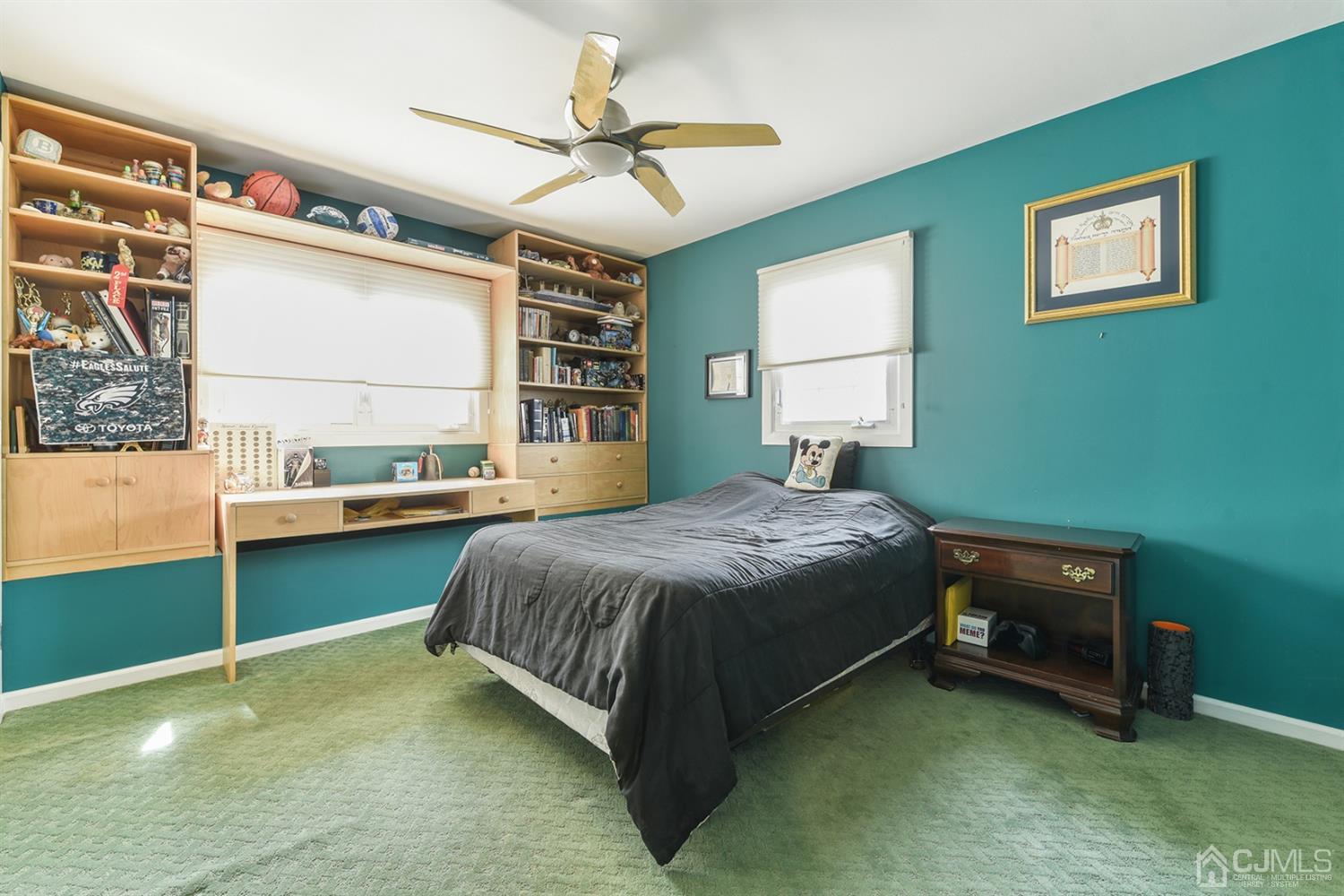 27 Agate Road East Brunswick, NJ 08816 - Photo 18 of 31 a spacious bedroom with a bed and a window