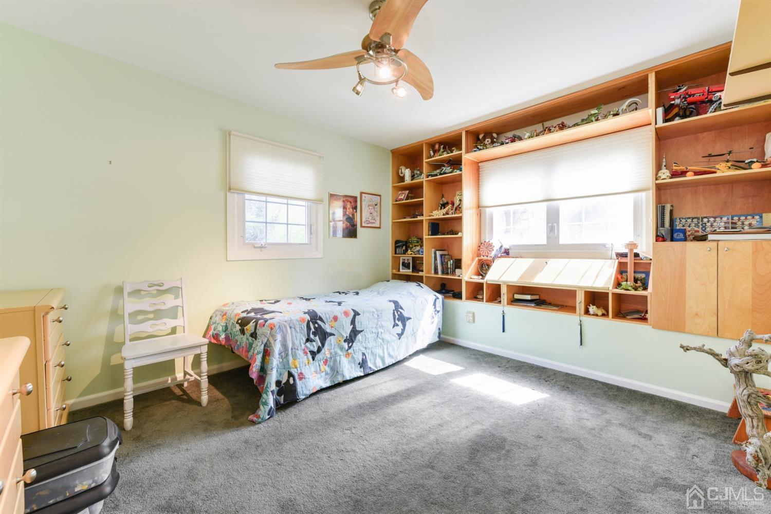 27 Agate Road East Brunswick, NJ 08816 - Photo 20 of 31 a spacious bedroom with a bed and a window