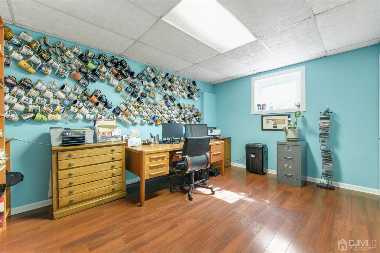 27 Agate Road East Brunswick, NJ 08816 - Photo 25 of 31 a view of a bedroom with furniture and wooden floor