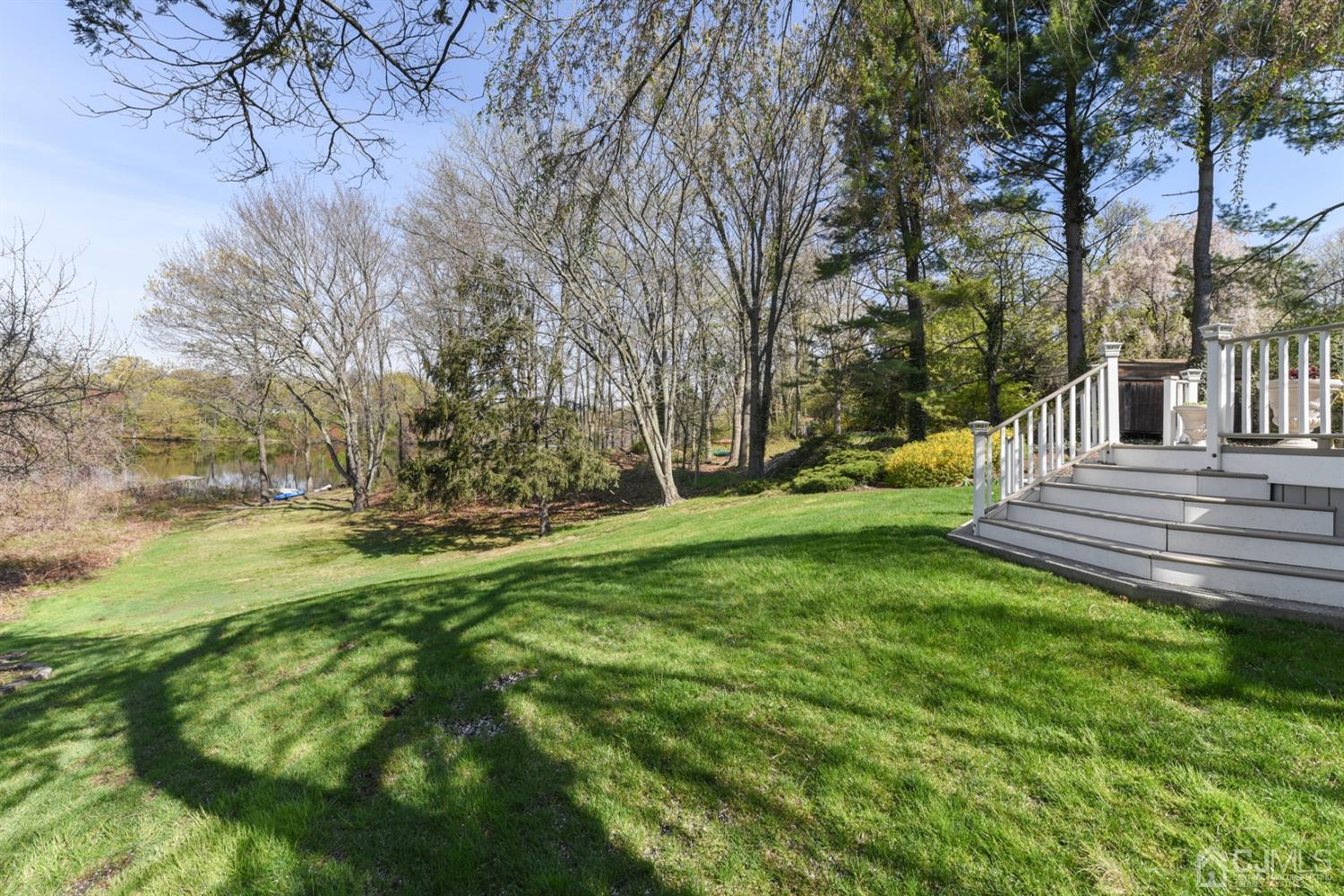 27 Agate Road East Brunswick, NJ 08816 - Photo 29 of 31 a view of a park with large trees