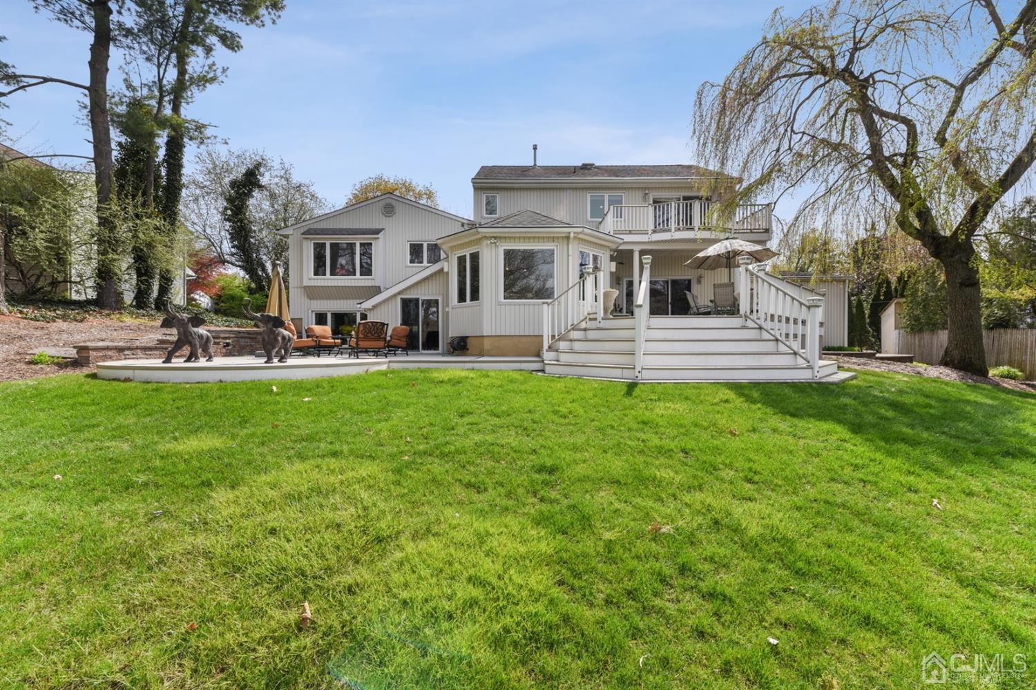 27 Agate Road East Brunswick, NJ 08816 - Photo 30 of 31 a front view of house with yard and green space
