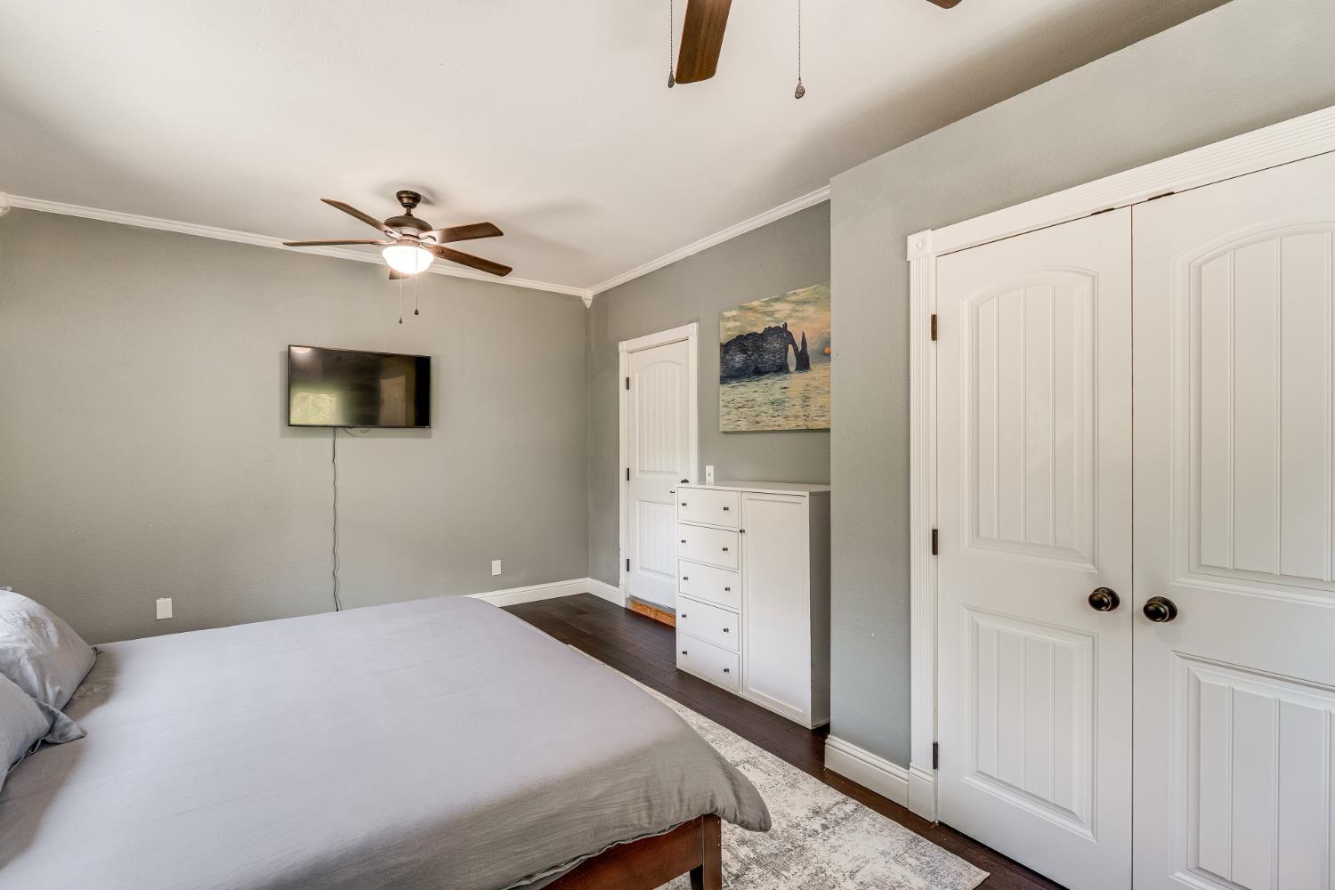 4640 Motto Lane Placerville, CA 95667 - Photo 23 of 40 a bedroom with a bed and a chandelier