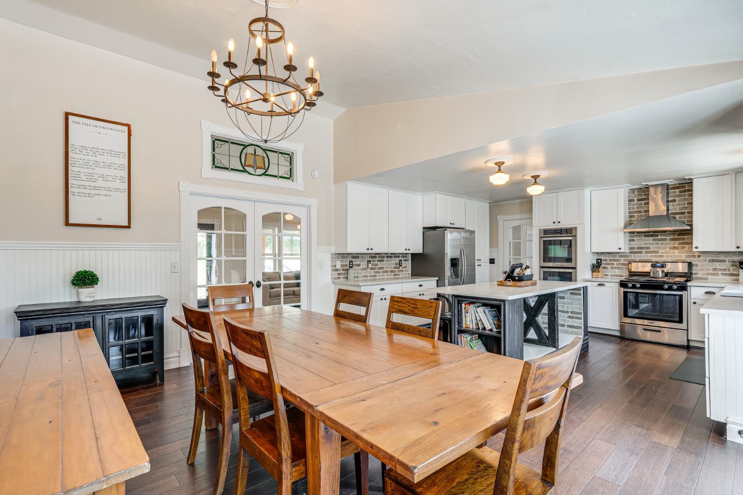 4640 Motto Lane Placerville, CA 95667 - Photo 6 of 40 a dining room with wooden floor and chandelier