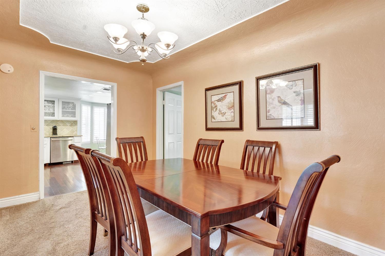 200 Lyons Street Madera, CA 93638 - Photo 12 of 32 a view of a dining room with furniture
