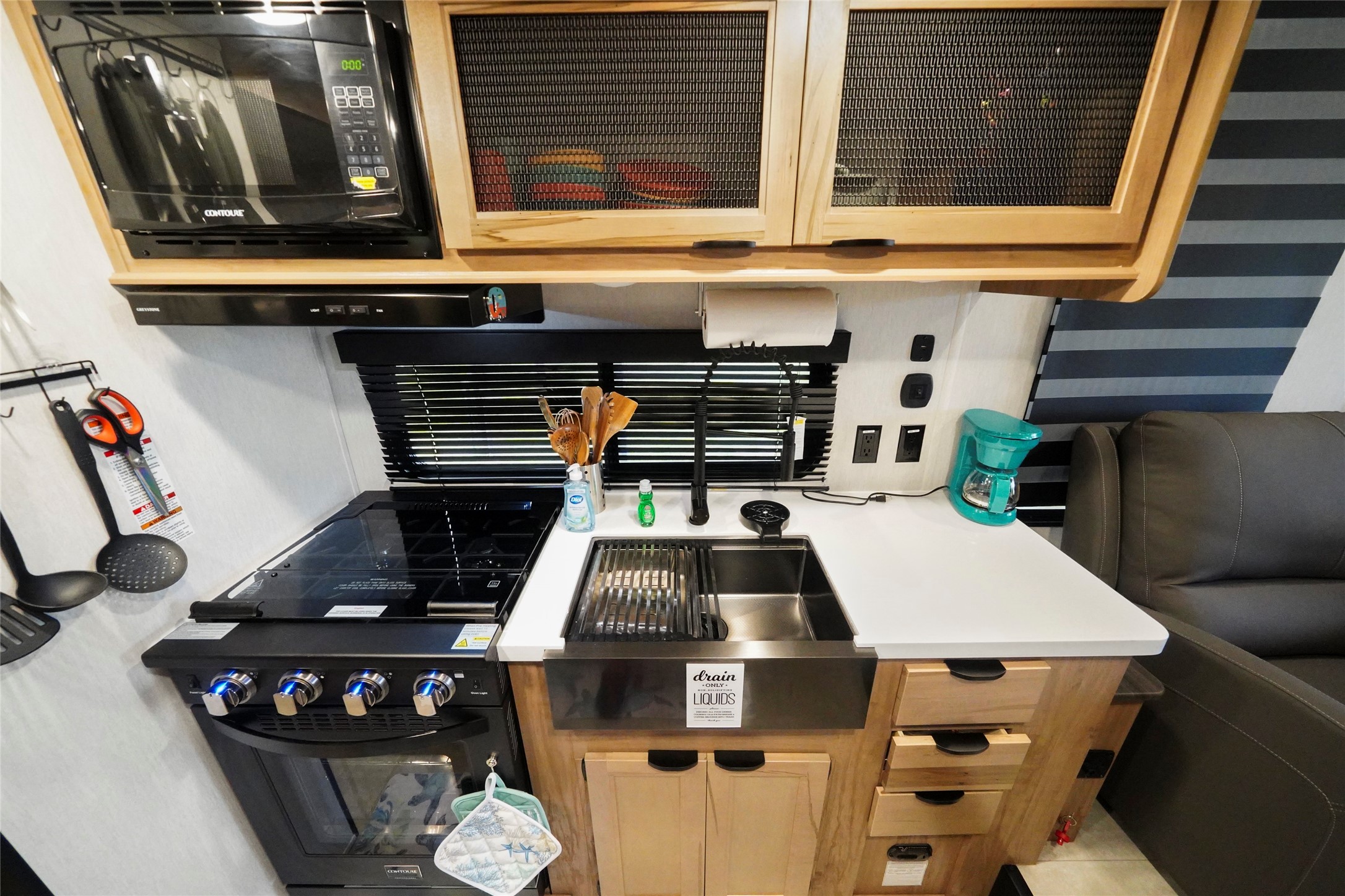 1845 Oleander Crystal Beach, TX 77650 - Photo 23 of 28 a stove top oven sitting inside of a kitchen