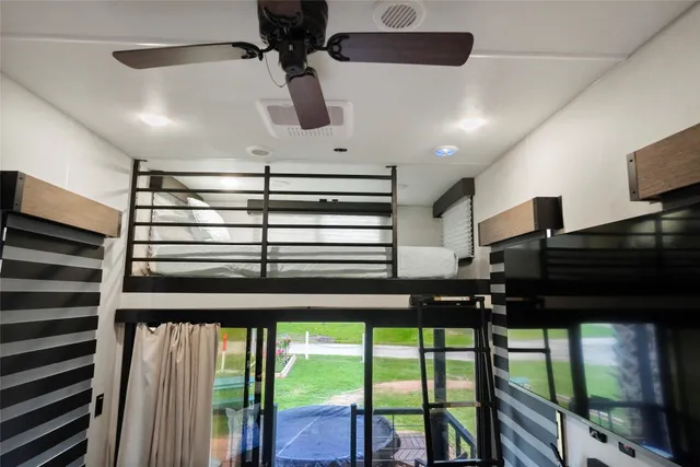 a view of entryway with wooden floor and stairs