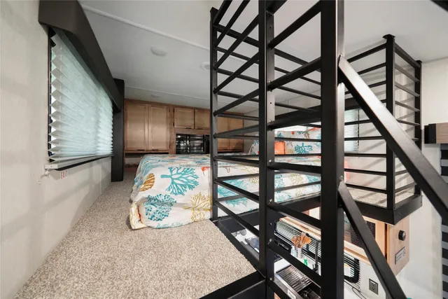 a kitchen with a stove and a refrigerator