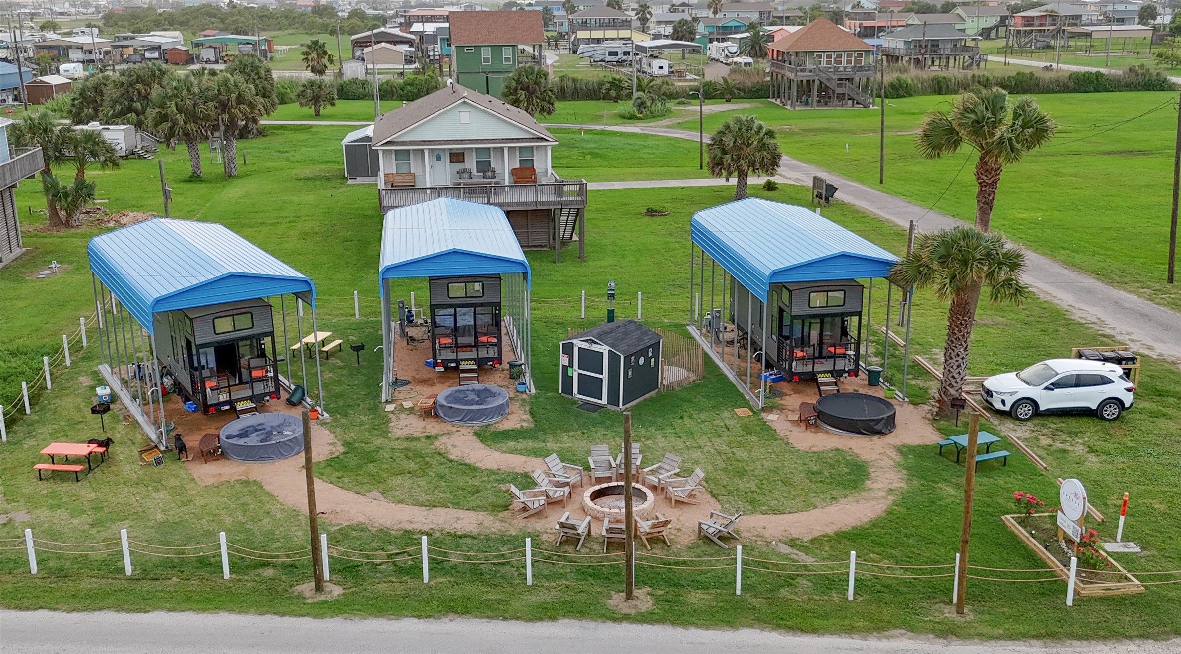 1845 Oleander Crystal Beach, TX 77650 - Photo 4 of 28 a view of a house with backyard porch and sitting area